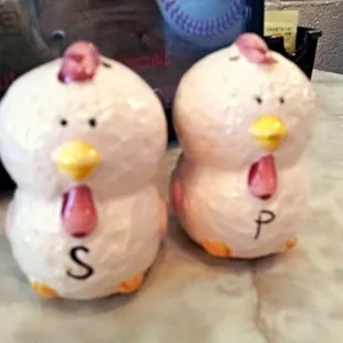 Every table has different set of cute salt &amp; pepper shakers.