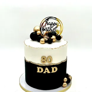 Masculine gold, black and white buttercream cake 80th birthday