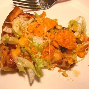 Taco pizza slice