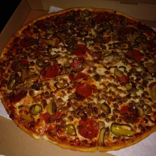 Sausage, Pepperoni, Mushrooms, Jalapenos....Talk about perfection and Joy, so absolutely fantastic!