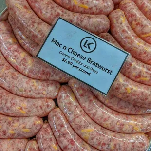 LK's Mac n' Cheese Brats are handcrafted with creamy cheddar and pasta.