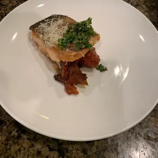 Arctic Char, tomato confit, mint Parmesan gremolata.