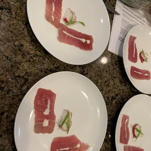 Smoked tuna with Spanish olive oil, radish and lemongrass cream.