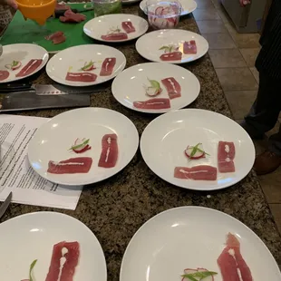 Smoked tuna with Spanish olive oil, radish and lemongrass cream.