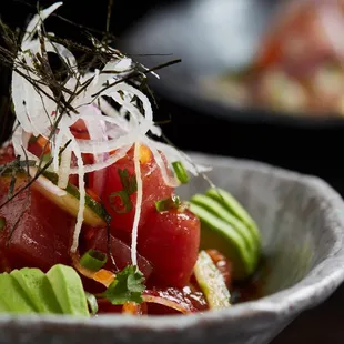 a close up of a salad in a bowl