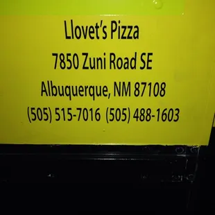 a sign for a pizza place