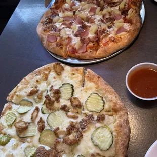 Top: Jammin Pig  Bottom: GI Devil with the hot sauce on the side  Both are personal size.