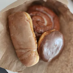 two doughnuts in a paper bag