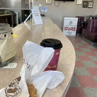 Coffee &amp; donut on counter (4.15)