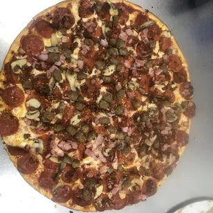 Pepperoni, Sausage, Ham, Bacon Pizza