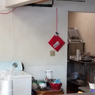 a kitchen with a washer and dryer