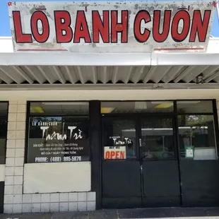 the entrance to a restaurant