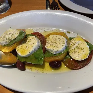 Heirloom tomato with mozzarella, basil, kalamatas, s/p, oo