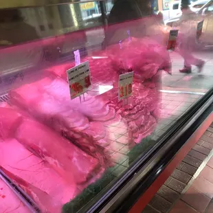 pink meat in display case