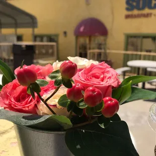 a vase of roses