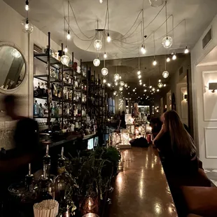 a woman sitting at the bar