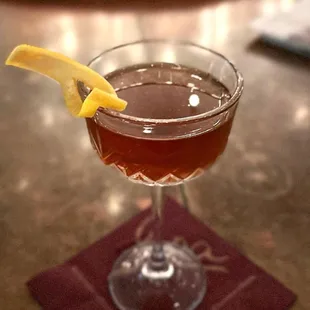 a cocktail in a coupe glass