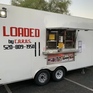 a food truck parked in a parking lot