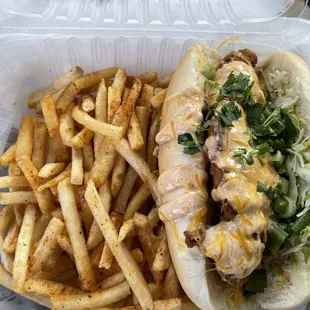 Loaded fries with animal hair and chicken sandwich