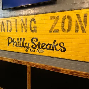 a yellow brick wall