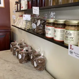 jars of food on a counter in a store