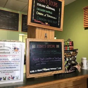 a menu and a sign for today's special