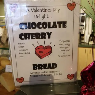 a sign for a chocolate cherry bread