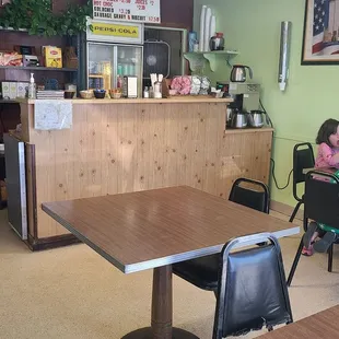a woman sitting at a table