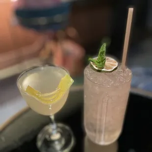 two cocktails on a table