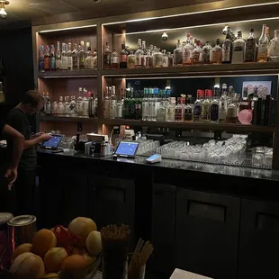 a man standing at the bar