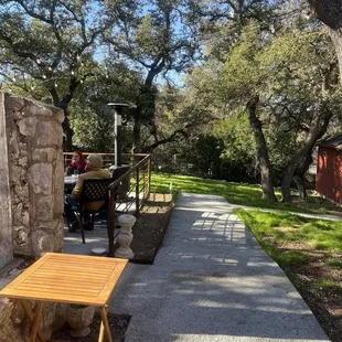 Sidewalk to the back deck. They do have heaters.