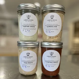 four jars of various flavors