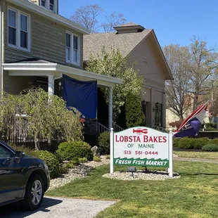 a car parked in front of a house