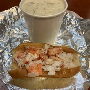 a hot dog and a cup of soup