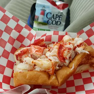 Lobsta roll with bbq potato chips.
