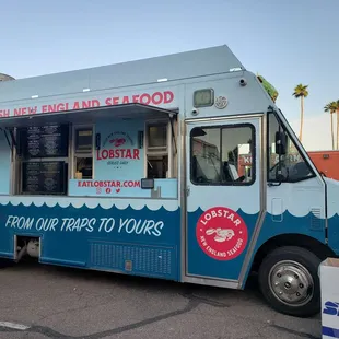 a food truck parked in a parking lot
