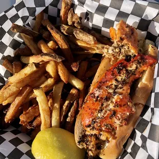 Super small potion lobster roll, no tail meat. Very greasy. Burnt fries.