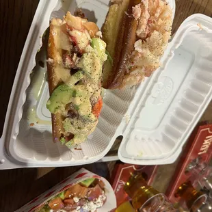 a close up of a sandwich in a styrofoam container