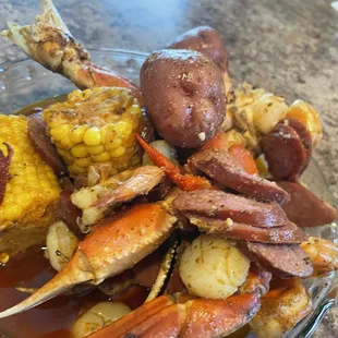 Combo D. G5. Snow Crab Legs. G12. Scallops. G4. Shrimp (No Head). Sausage. S1. Corn. S2. Potato.  Juicy Special!!!