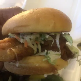 Fish sammitch. Please add the house tartar sauce, cheese  tomato  and pickles  and it would be perfect.