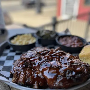 Half rack of ribs, baked beans, collard greens, mac and cheese