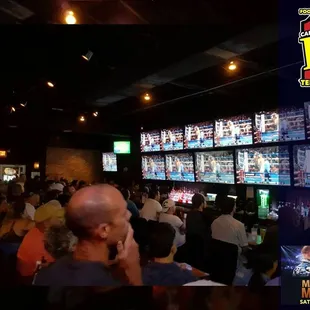 a large crowd of people watching the game
