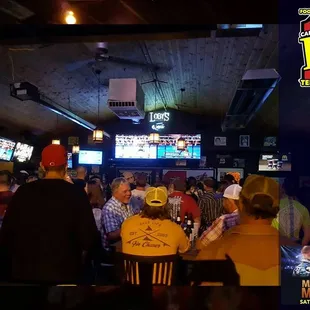 a large group of people at a bar