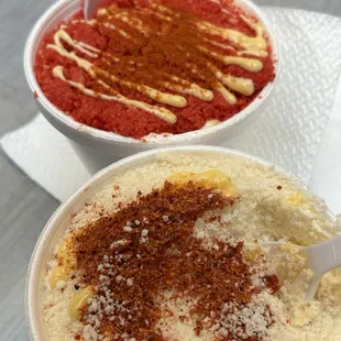 two bowls of food on a table