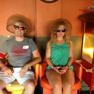 a man and a woman sitting in chairs