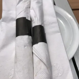 Filthy silverware delivered to the table