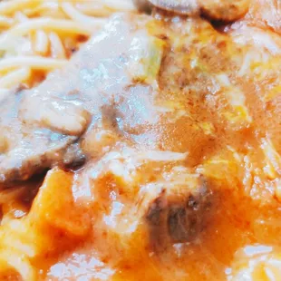 B13. Baked Ox Tongue in Tomato Sauce Over spaghetti