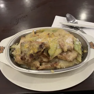B3. Baked Pork Chop in Portuguese Style Sauce Over Rice