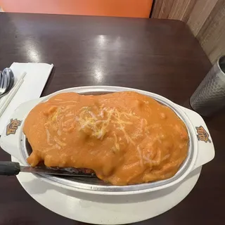B4. Baked Pork Chop in Tomato Sauce Over Rice