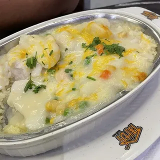 B9. Baked Fish & Corn in Cream Sauce Over Rice